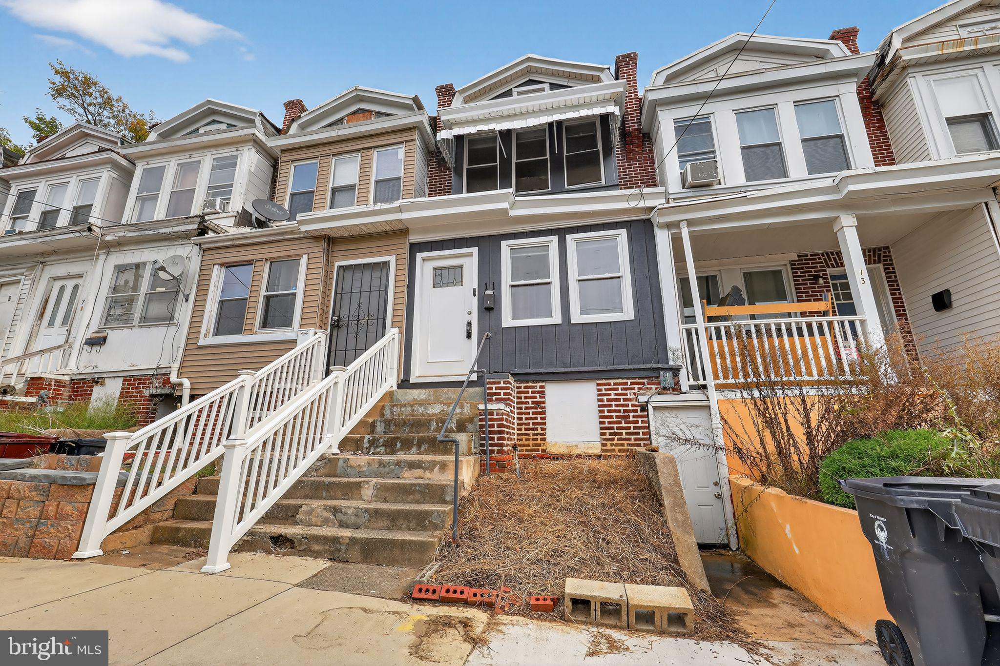 11 East 24th Street Wilmington, DE 19802 - Photo 3 of 31 a front view of a house with a yard