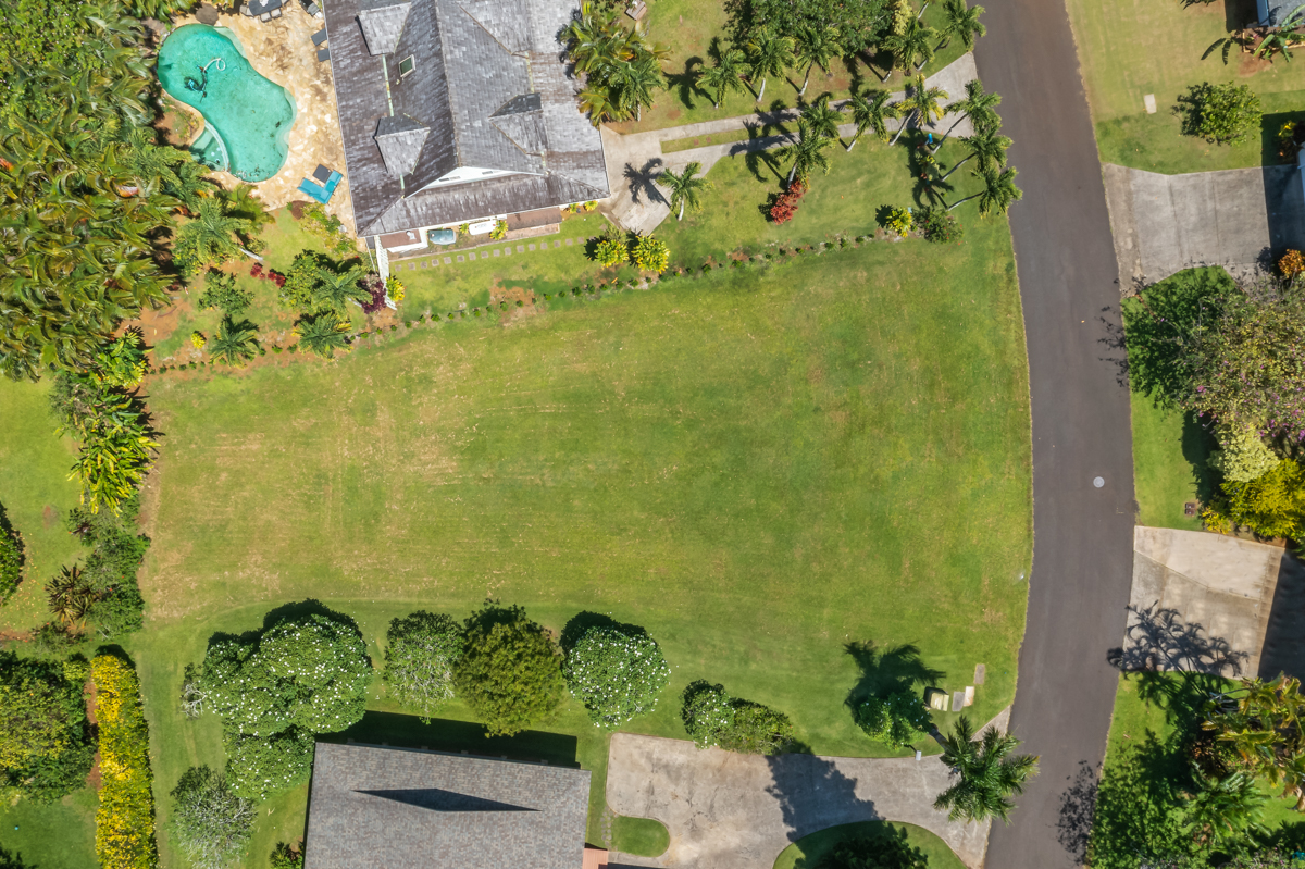 4890 Akai Road Princeville, HI 96722 - Photo 6 of 15 an aerial view of a residential houses with yard
