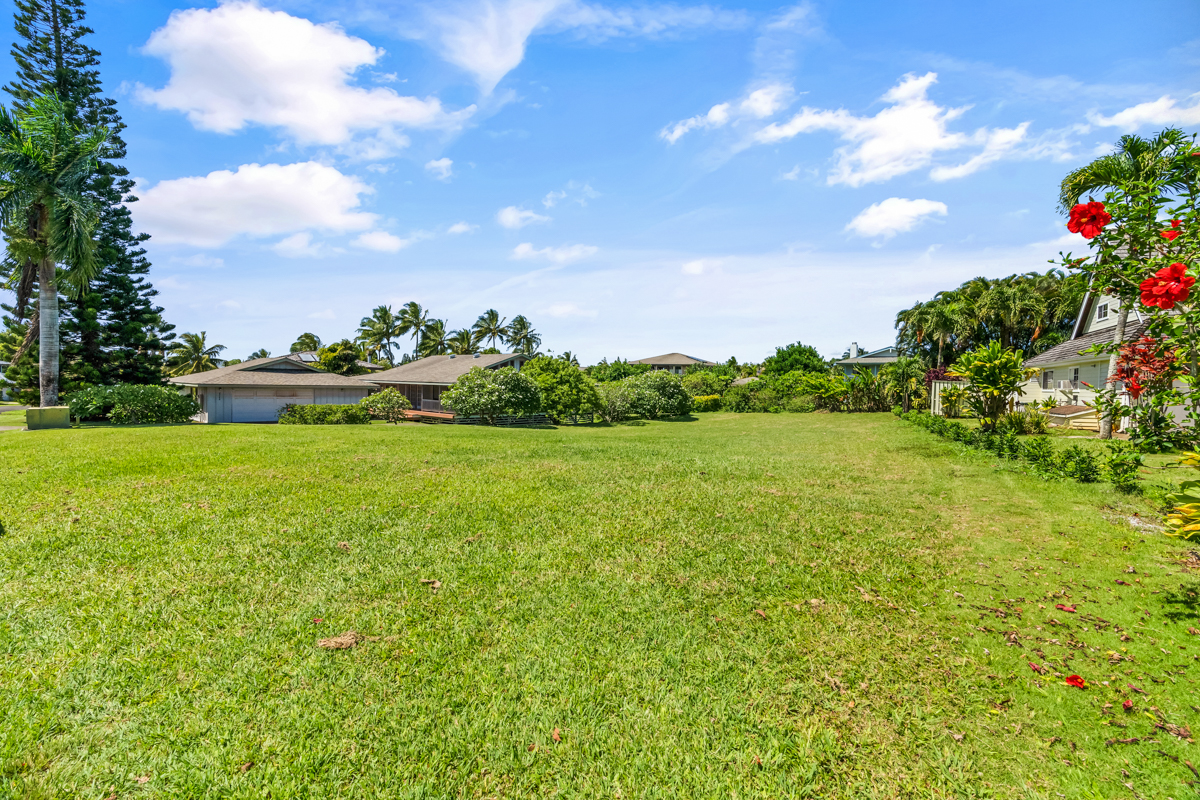 4890 Akai Road Princeville, HI 96722 - Photo 8 of 15 a yard with swimming pool and green space
