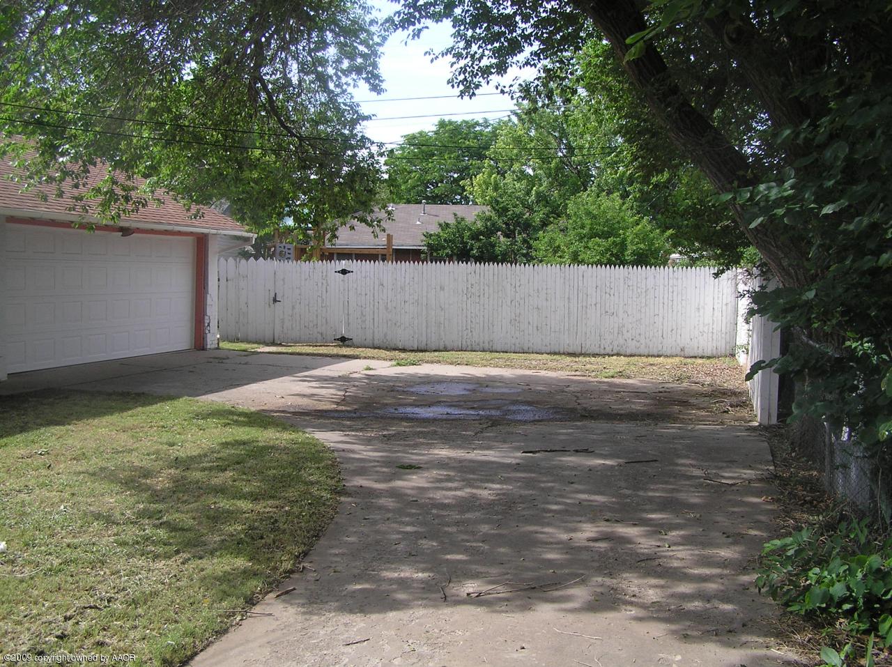 1409 Southwest 34th Avenue Amarillo, TX 79109 - Photo 3 of 11 a view of a backyard