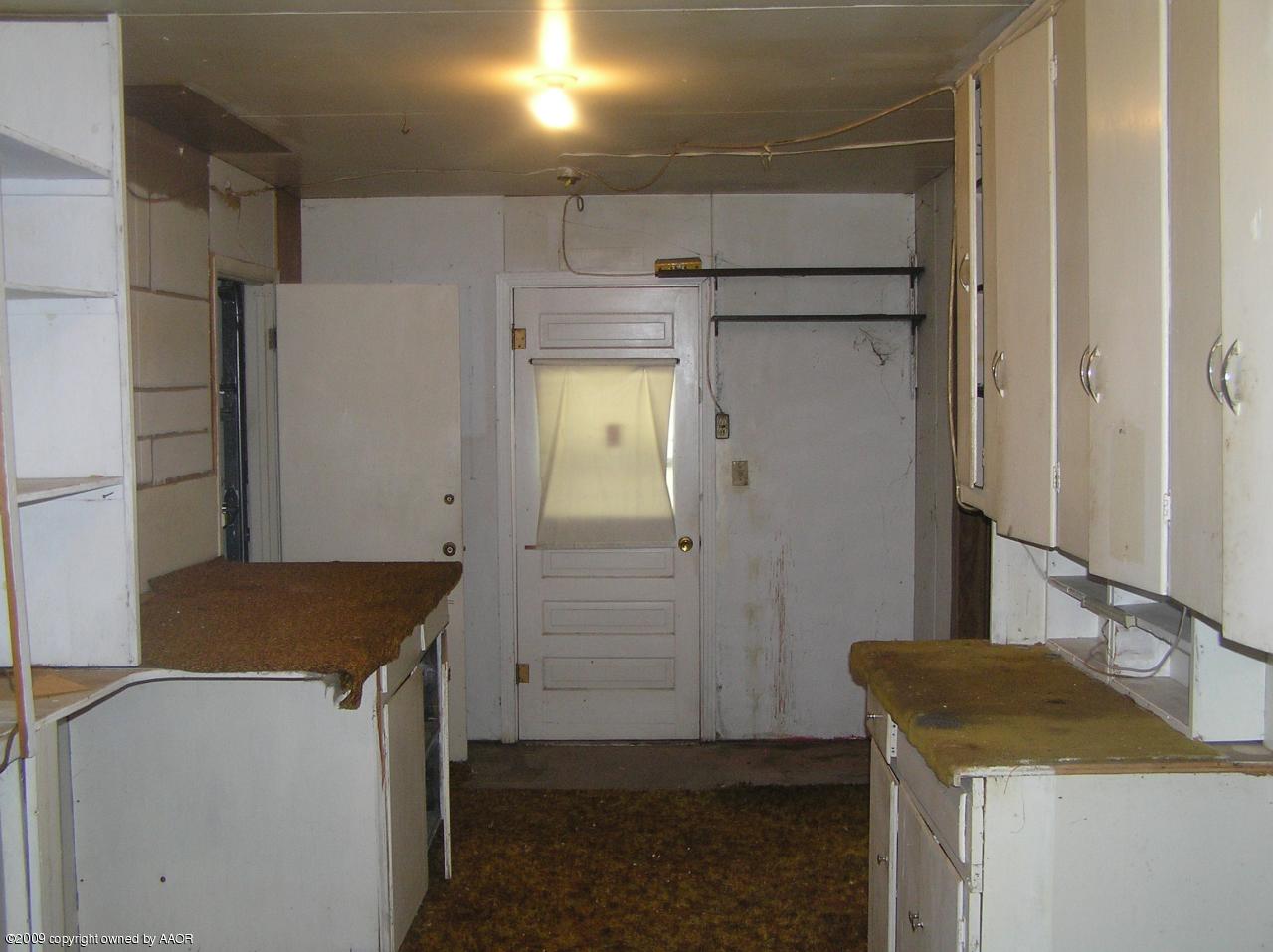 1409 Southwest 34th Avenue Amarillo, TX 79109 - Photo 6 of 11 a room with storage and utility