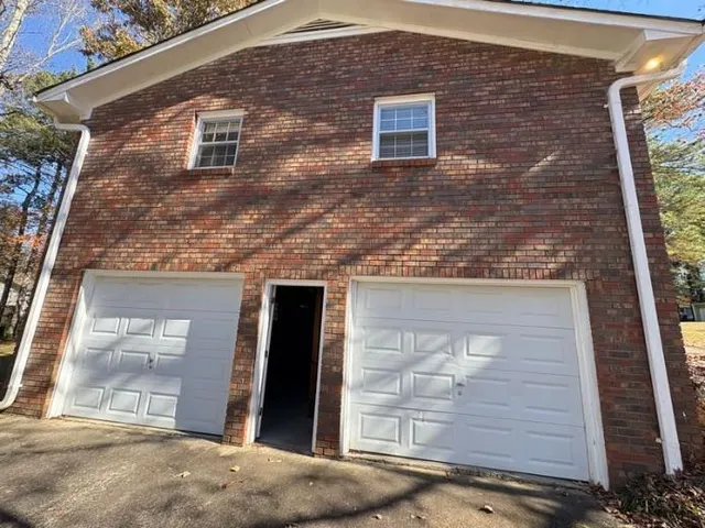 a building view with a brick wall