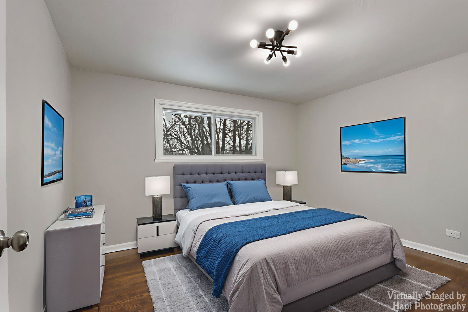 1835 West Weathersfield Way Schaumburg, IL 60193 - Photo 18 of 54 a bedroom with a large bed and a chandelier