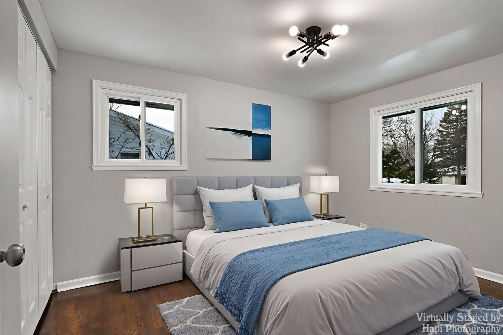 1835 West Weathersfield Way Schaumburg, IL 60193 - Photo 21 of 54 a bedroom with a bed and a chandelier