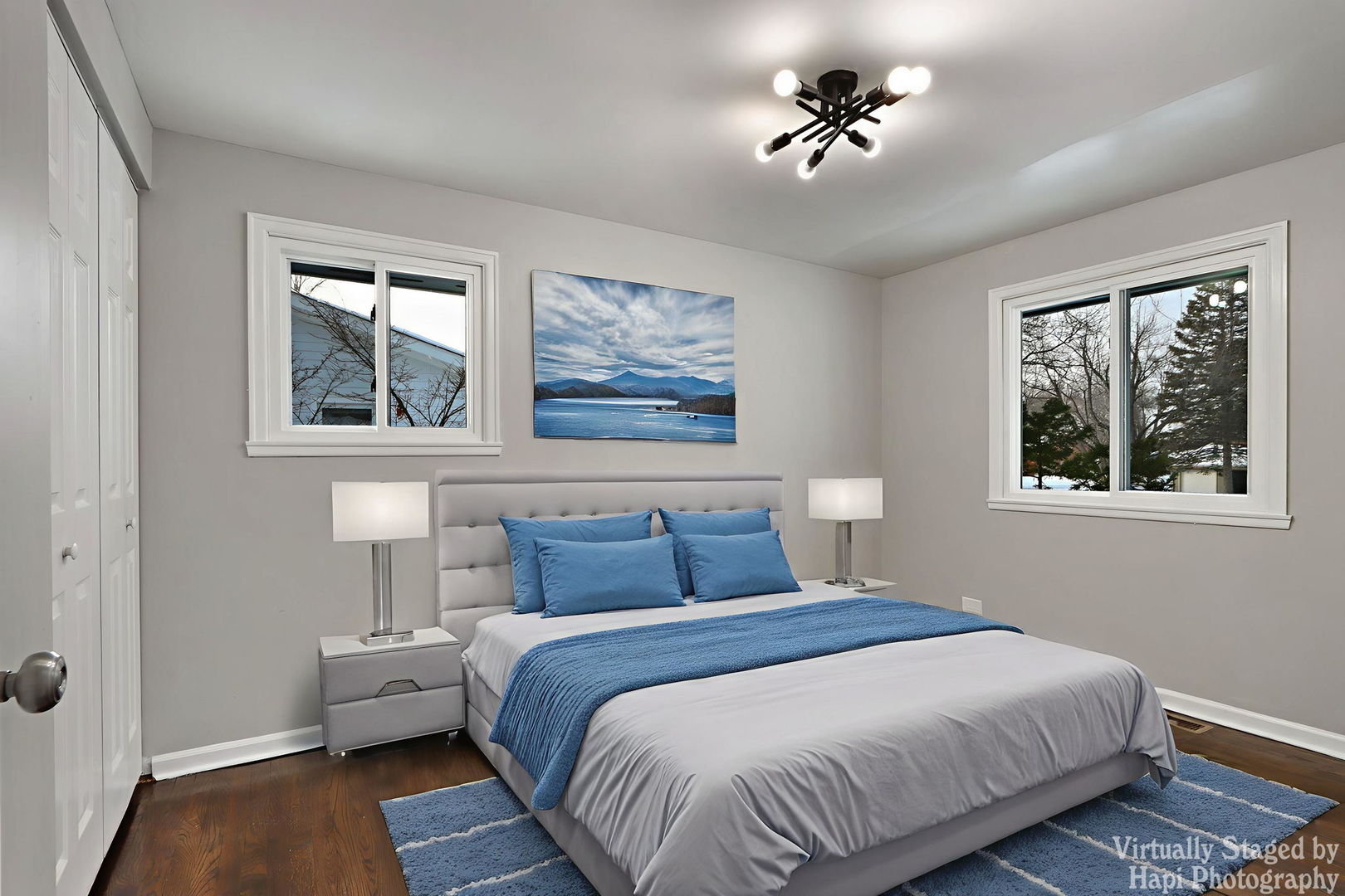 1835 West Weathersfield Way Schaumburg, IL 60193 - Photo 22 of 54 a bedroom with a bed and a chandelier