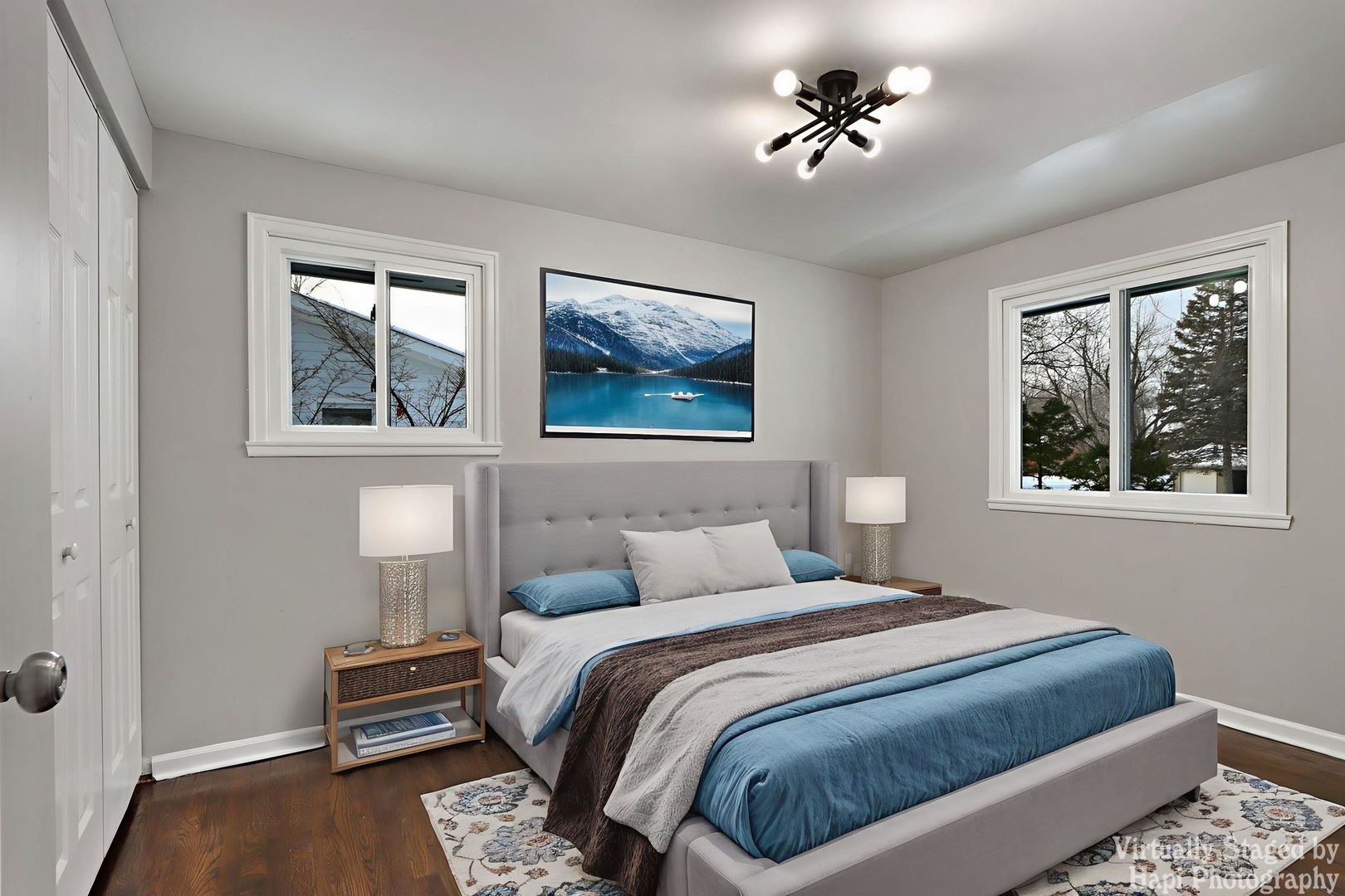 1835 West Weathersfield Way Schaumburg, IL 60193 - Photo 23 of 54 a bedroom with a bed and a chandelier