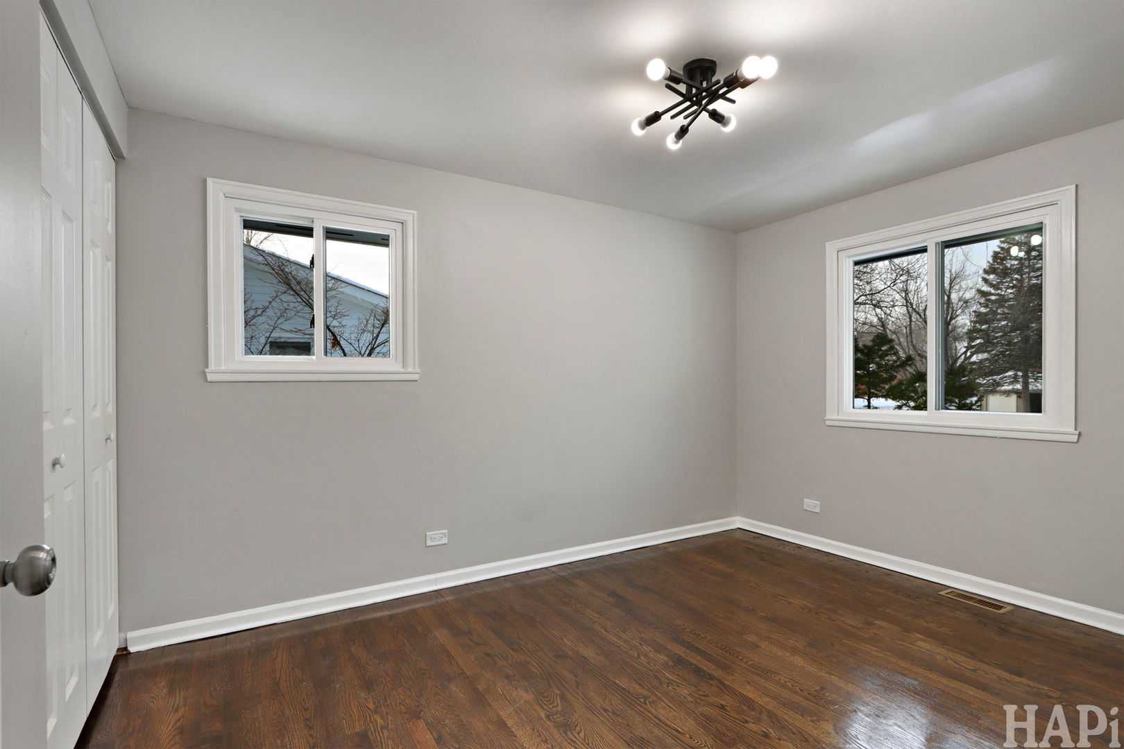 1835 West Weathersfield Way Schaumburg, IL 60193 - Photo 24 of 54 wooden floor in an empty room with a window