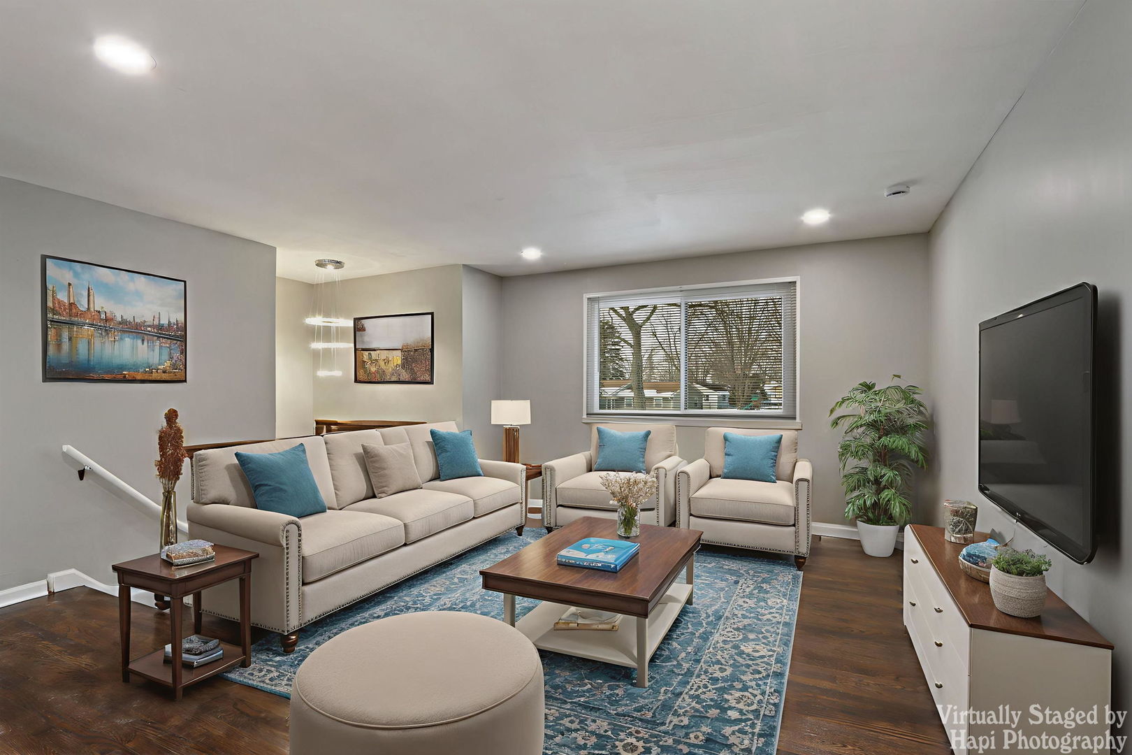 1835 West Weathersfield Way Schaumburg, IL 60193 - Photo 3 of 54 a living room with furniture a rug a window and a flat screen tv