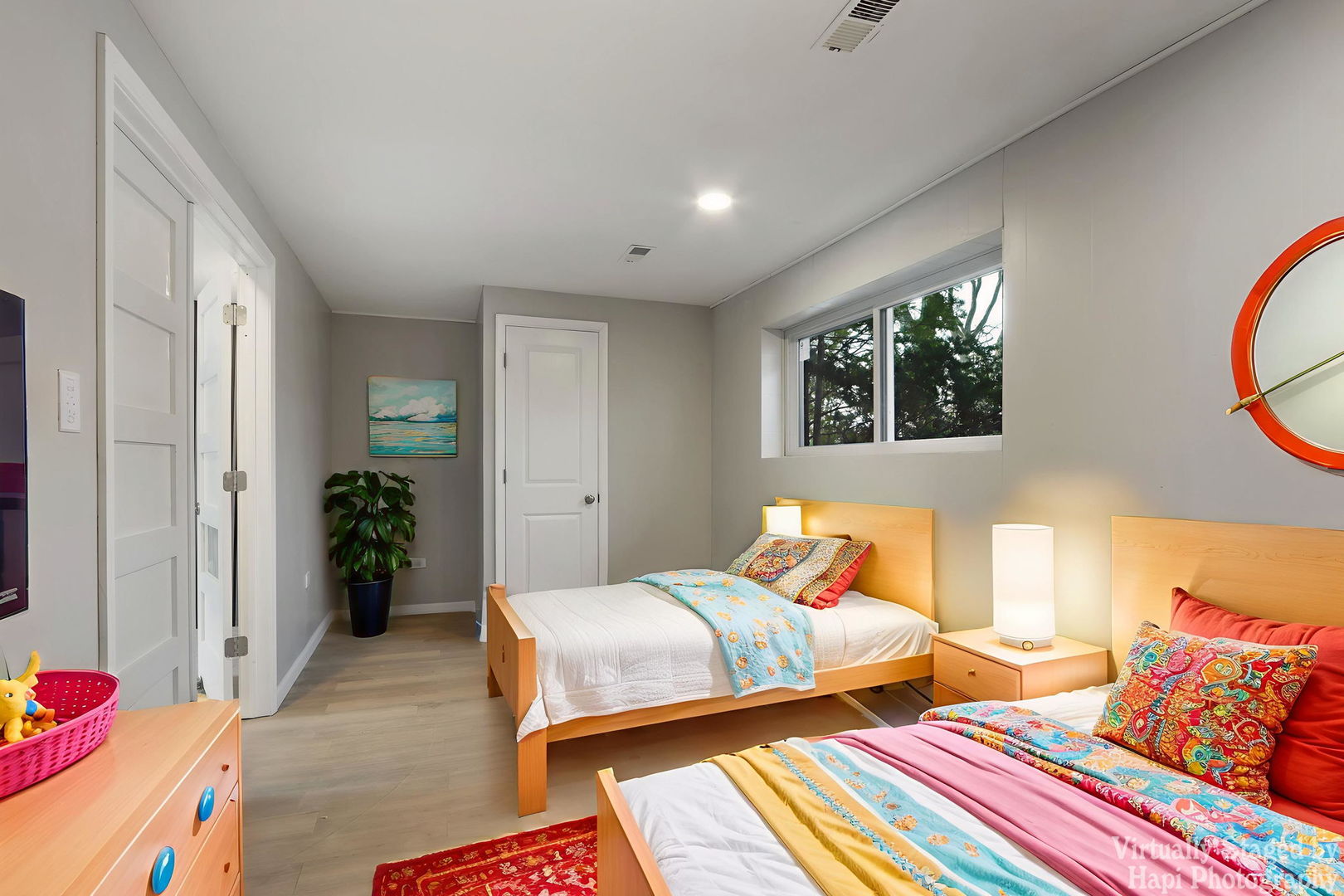 1835 West Weathersfield Way Schaumburg, IL 60193 - Photo 39 of 54 a bedroom with two beds and potted plant next to a window