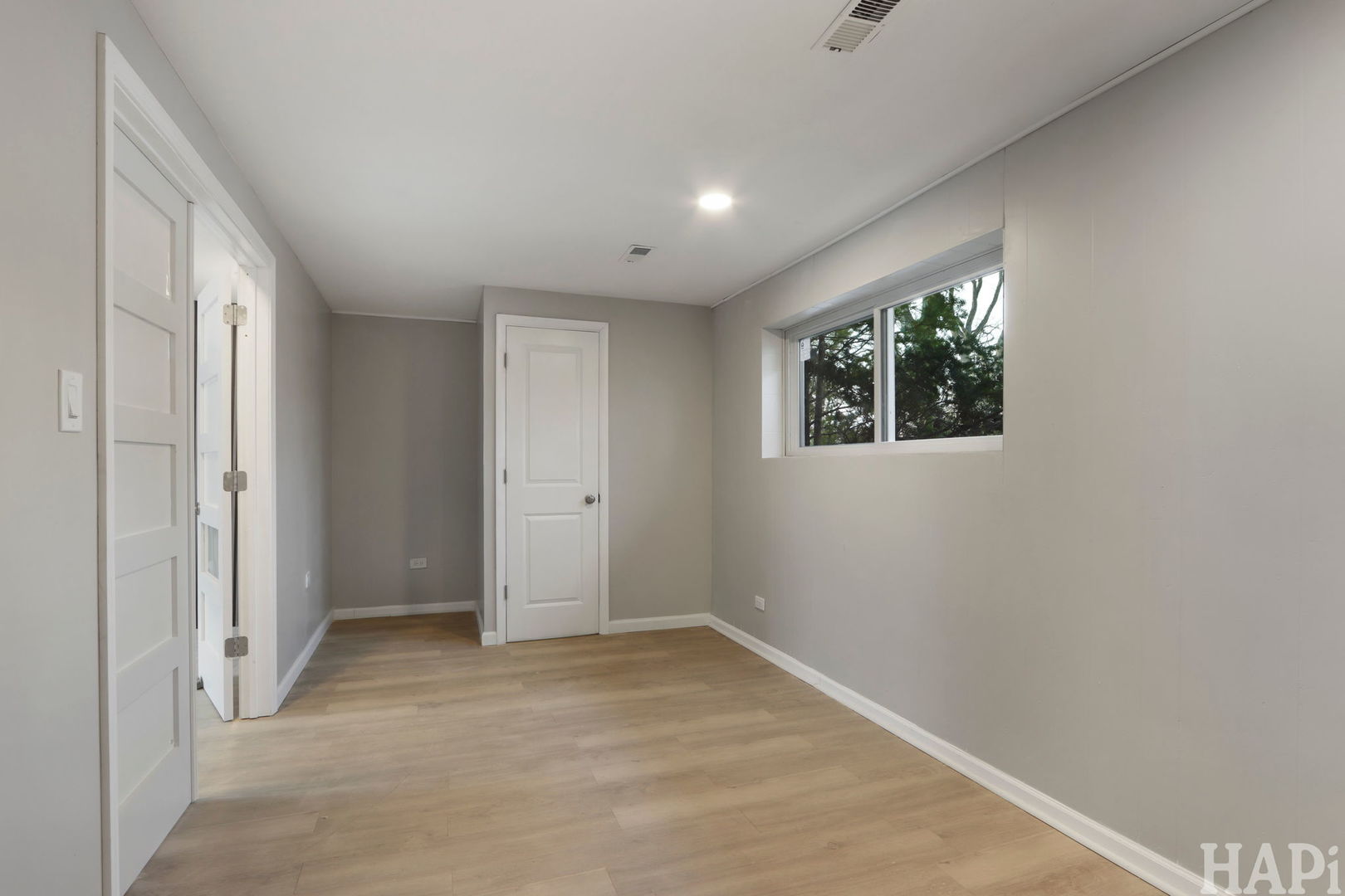 1835 West Weathersfield Way Schaumburg, IL 60193 - Photo 40 of 54 a view of an empty room with windows and closet
