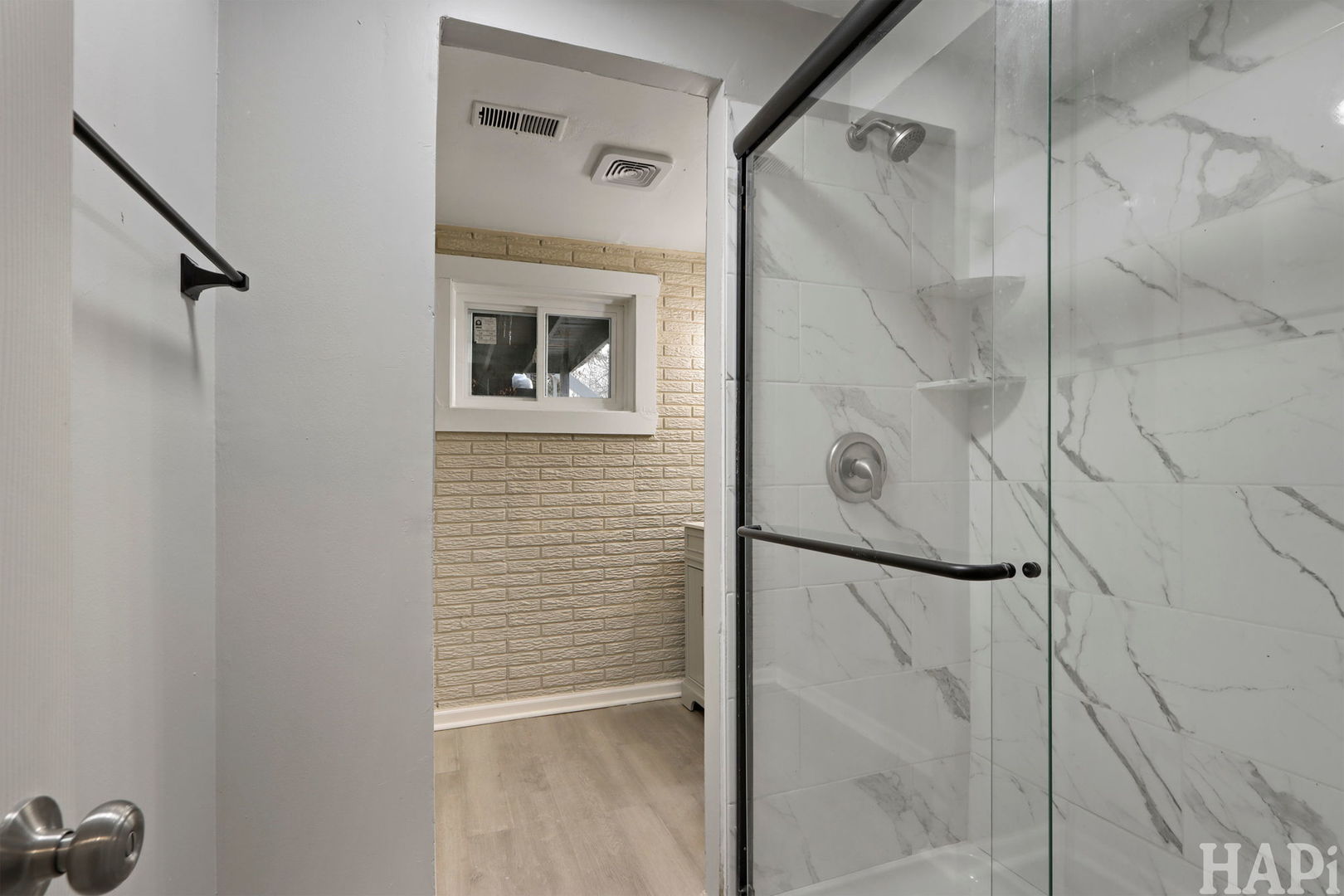 1835 West Weathersfield Way Schaumburg, IL 60193 - Photo 41 of 54 a bathroom with a shower and a mirror