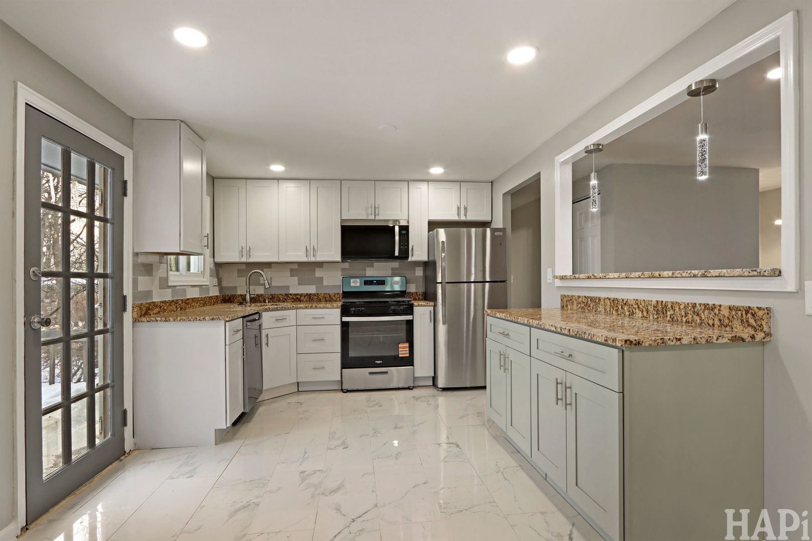 1835 West Weathersfield Way Schaumburg, IL 60193 - Photo 9 of 54 a kitchen with a refrigerator sink and stove top oven
