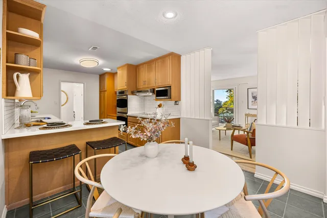 a spacious bedroom with a bed and a fireplace