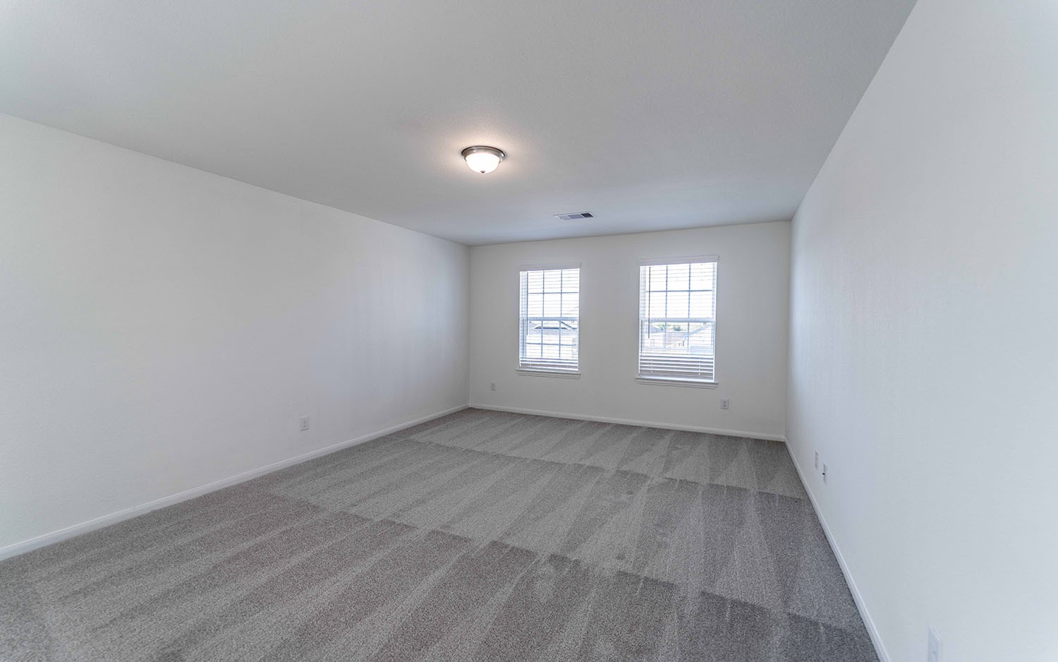 425 Monarch Trail Huntsville, TX 77340 - Photo 12 of 19 a view of an empty room with a window