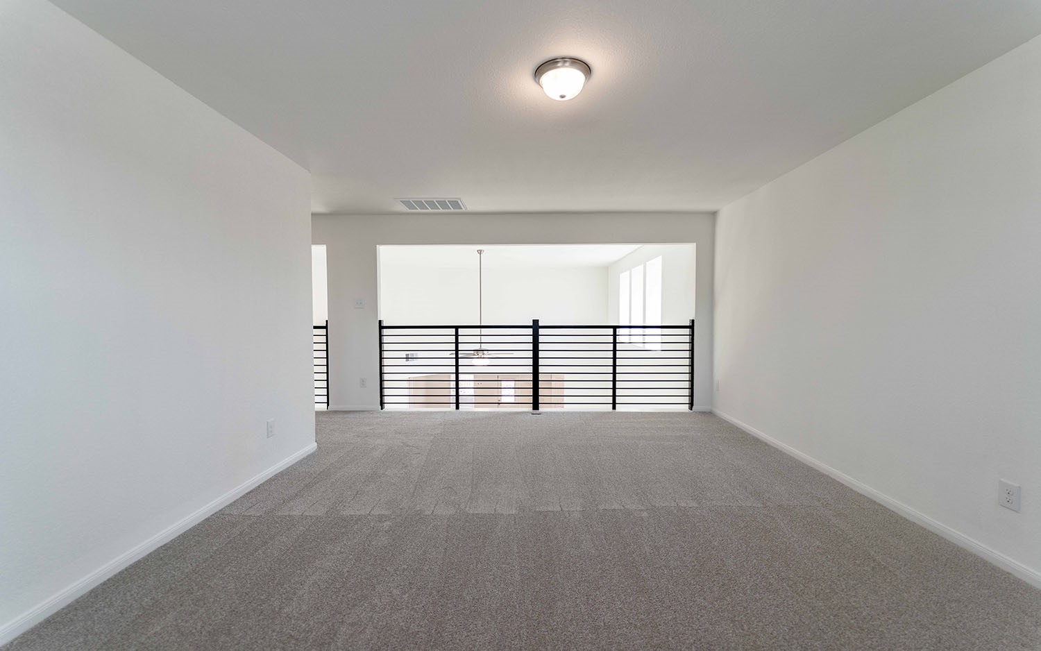 425 Monarch Trail Huntsville, TX 77340 - Photo 13 of 19 an empty room with windows