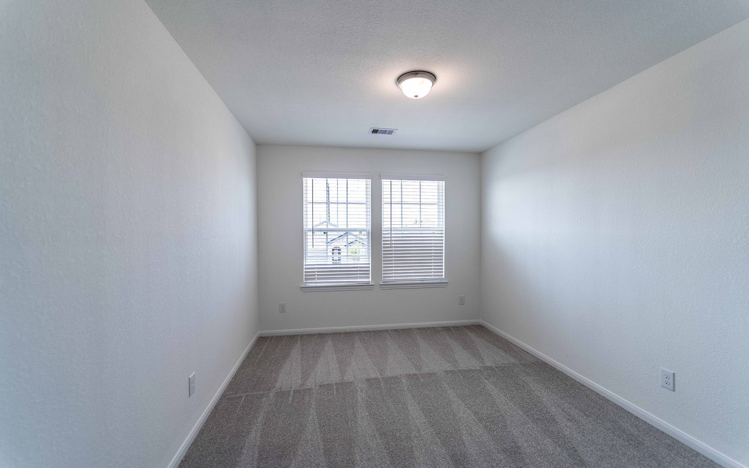 425 Monarch Trail Huntsville, TX 77340 - Photo 14 of 19 an empty room with a window