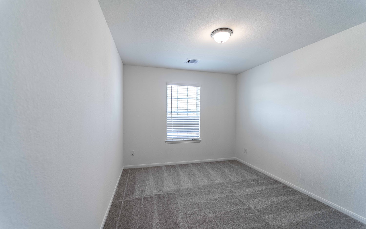 425 Monarch Trail Huntsville, TX 77340 - Photo 17 of 19 an empty room with a window