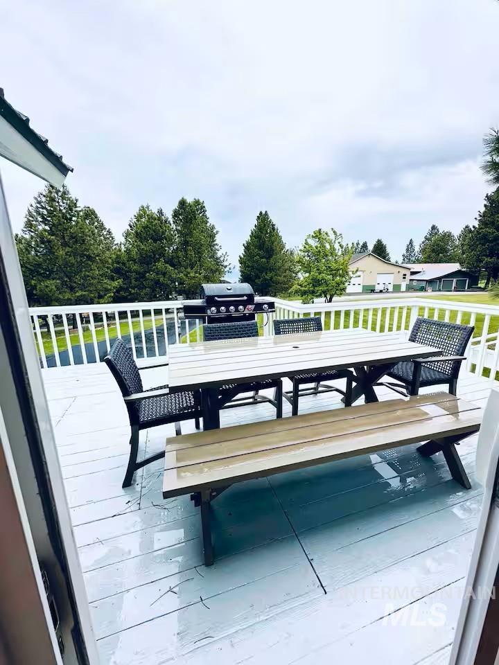 126 Par Drive Cascade, ID 83611 - Photo 6 of 45 Deck featuring outdoor dining area and grilling area