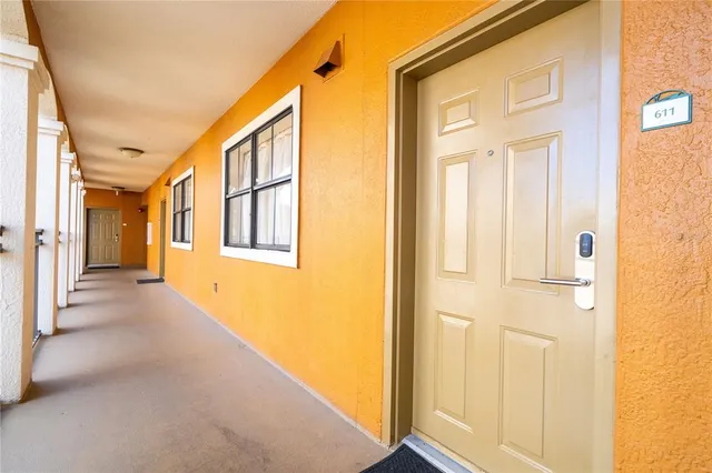 a kitchen with stainless steel appliances granite countertop a refrigerator stove and microwave