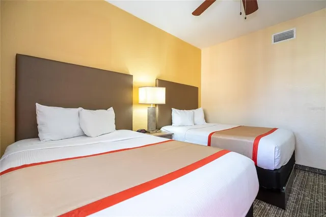 a bathroom with a tub and shower