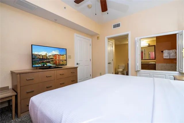 a front view of a building with traffic signal lights