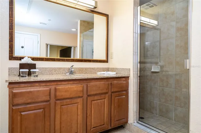 a lobby with furniture and floor to ceiling window