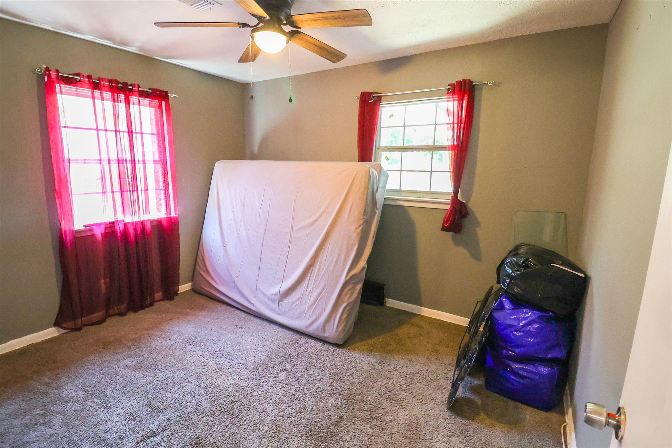 416 Clara Road South Houston, TX 77587 - Photo 13 of 50 a view of a room with window and cabinet