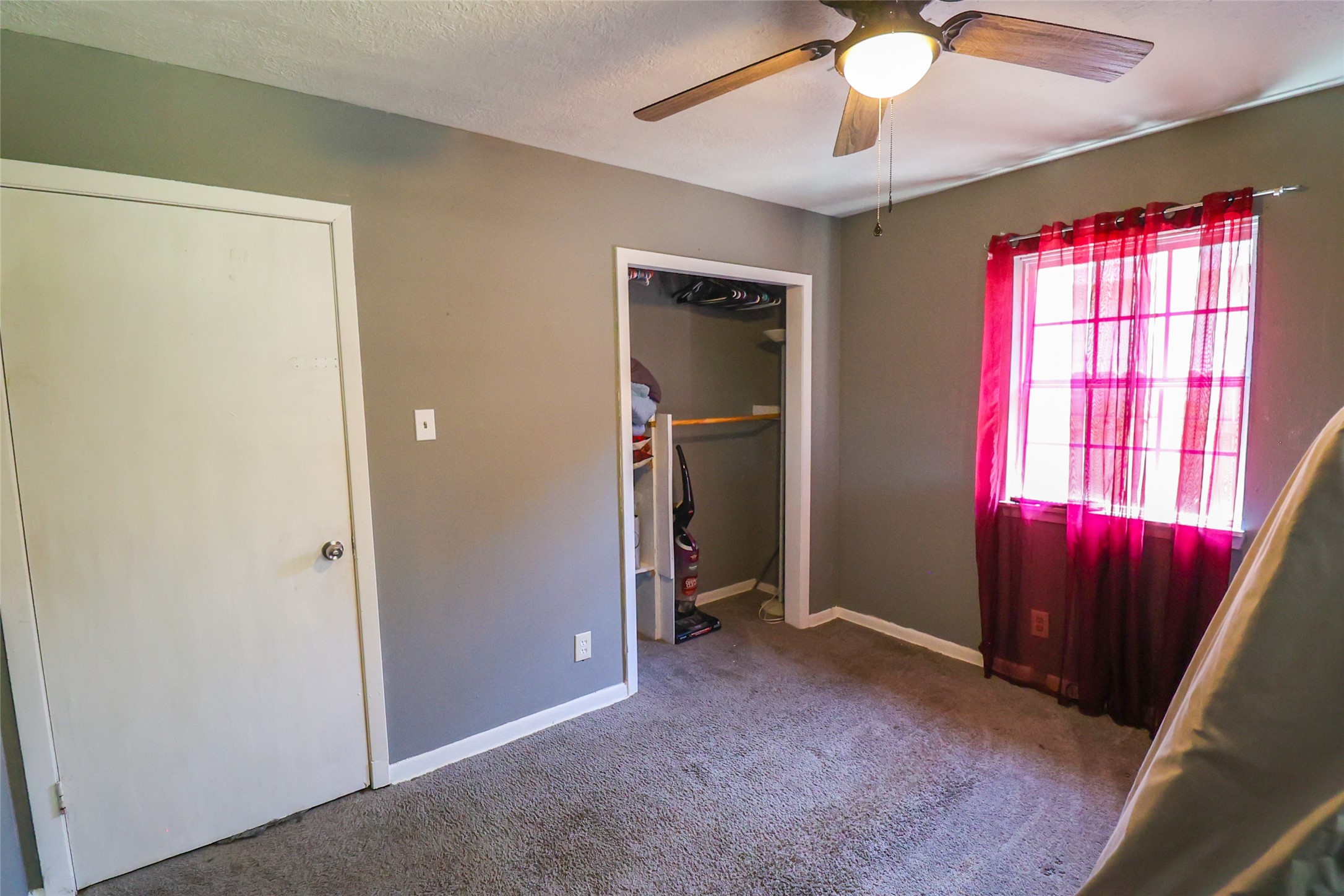 416 Clara Road South Houston, TX 77587 - Photo 14 of 50 a view of a room with a window and chandelier fan