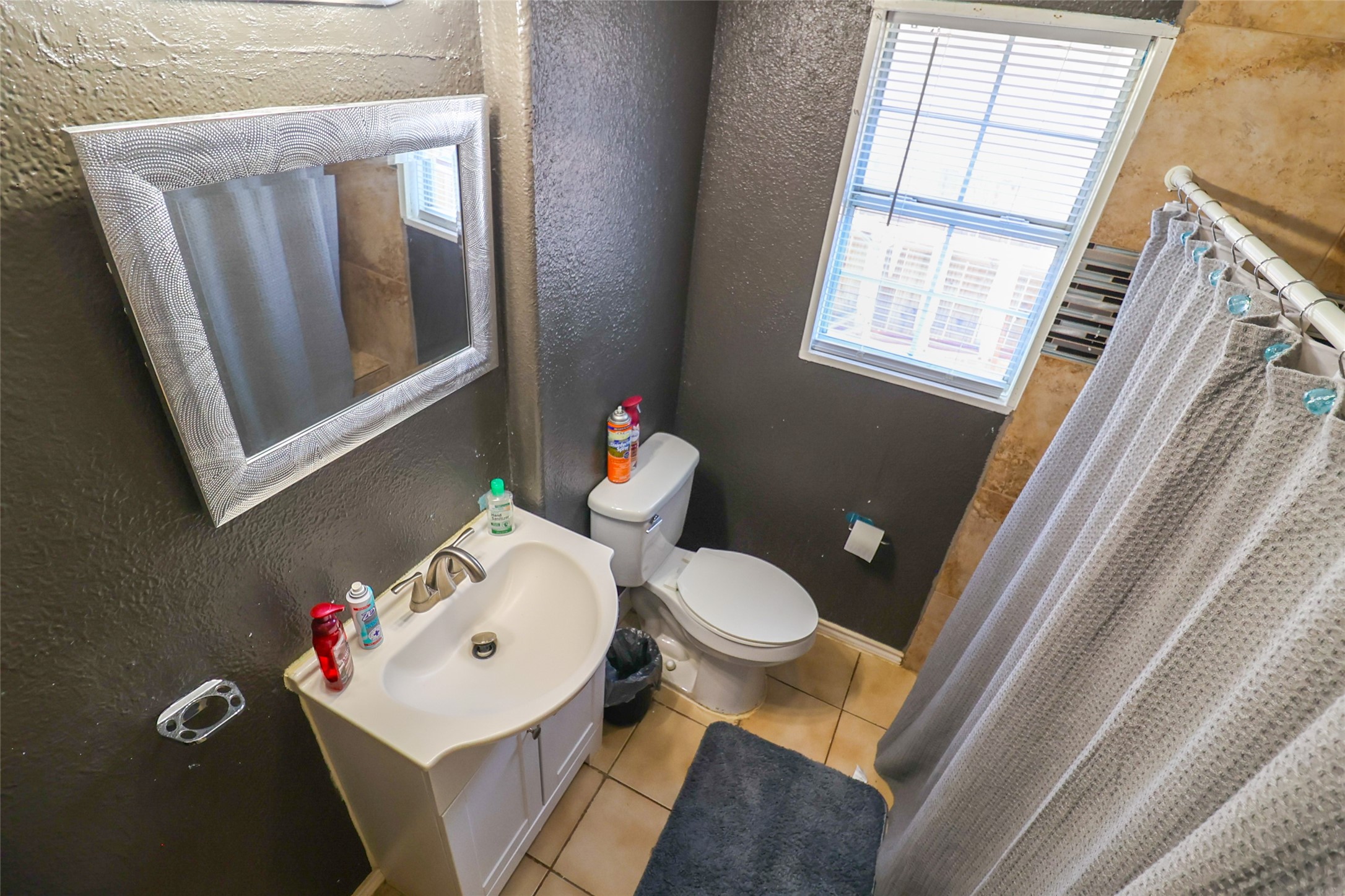 416 Clara Road South Houston, TX 77587 - Photo 15 of 50 a bathroom with a sink toilet and a window
