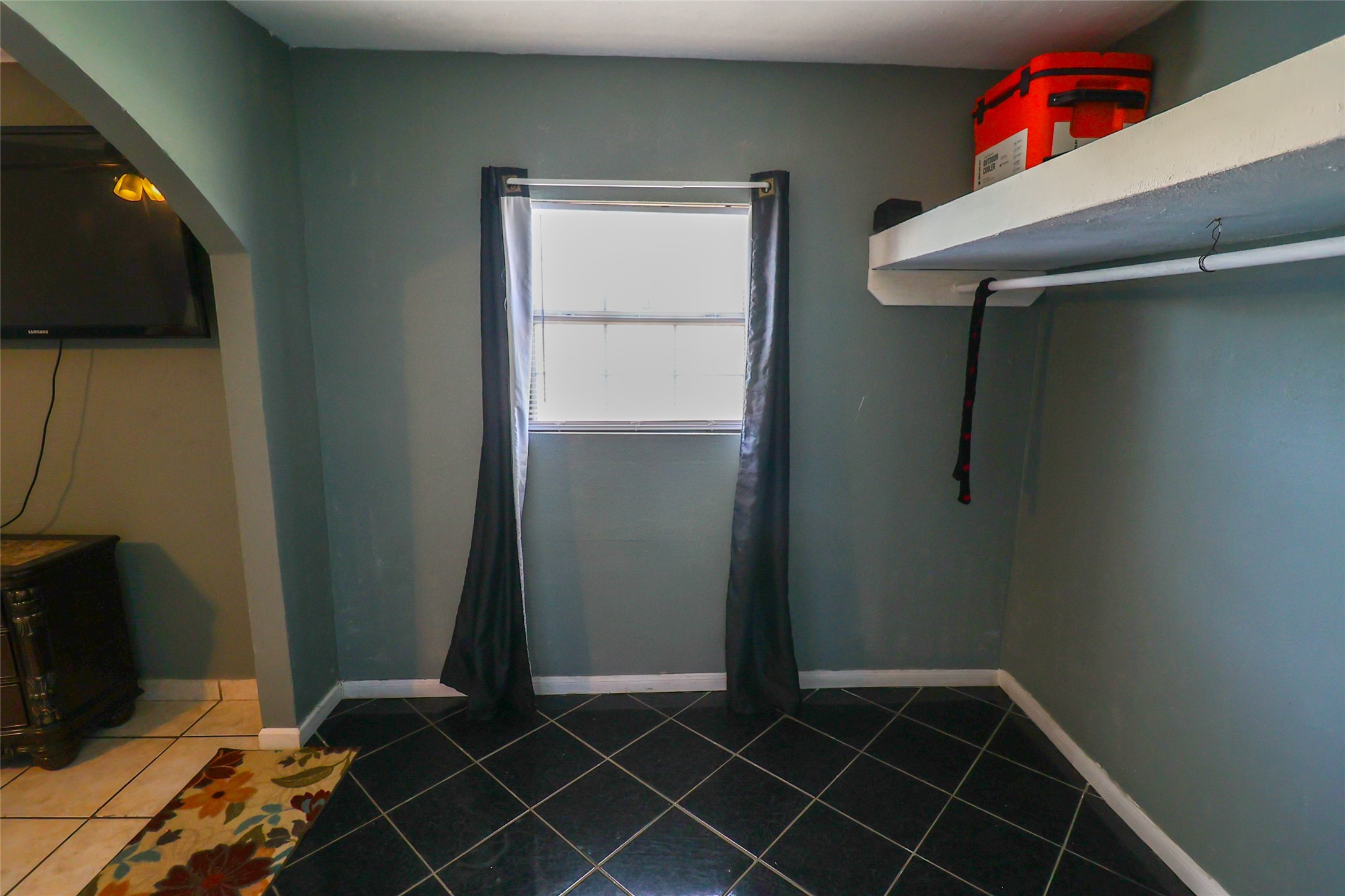 416 Clara Road South Houston, TX 77587 - Photo 23 of 50 a room with walk in closet and wooden floor