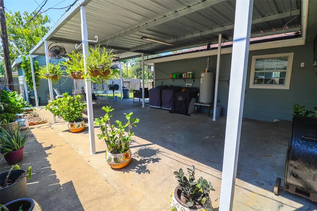 a view of room with furniture and a window