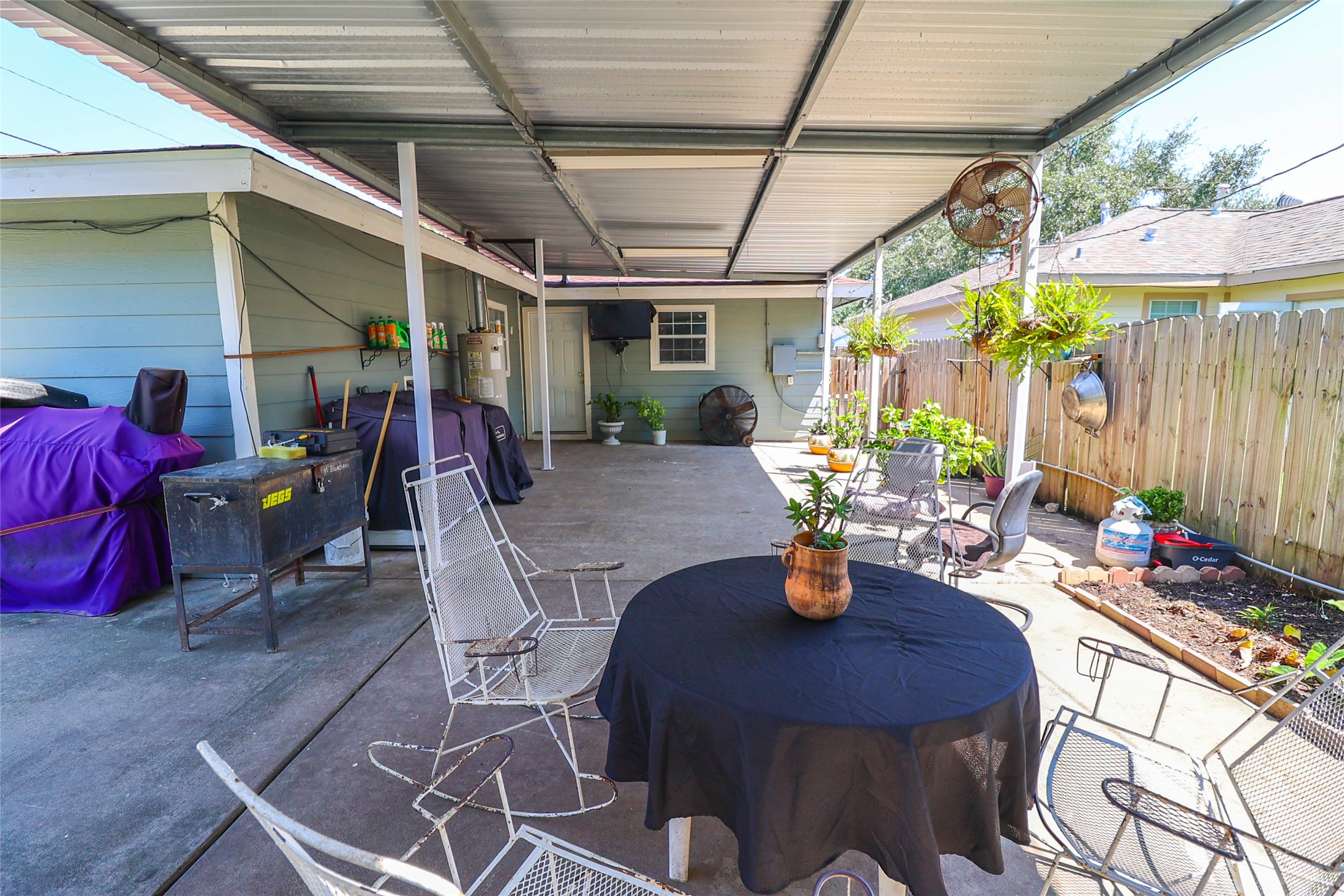 416 Clara Road South Houston, TX 77587 - Photo 37 of 50 a view of a dining table and chairs in the patio