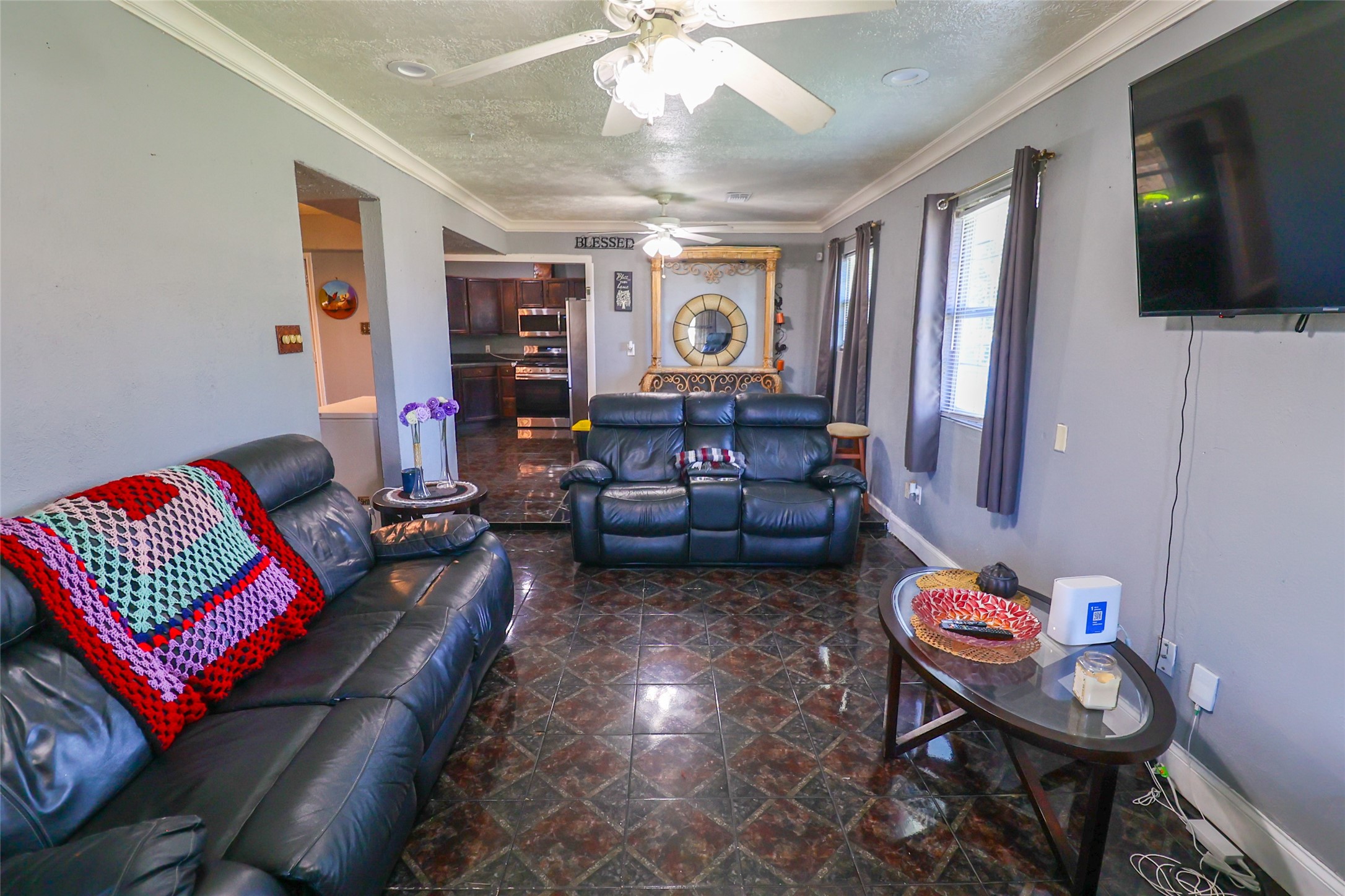 416 Clara Road South Houston, TX 77587 - Photo 4 of 50 a living room with furniture and a flat screen tv