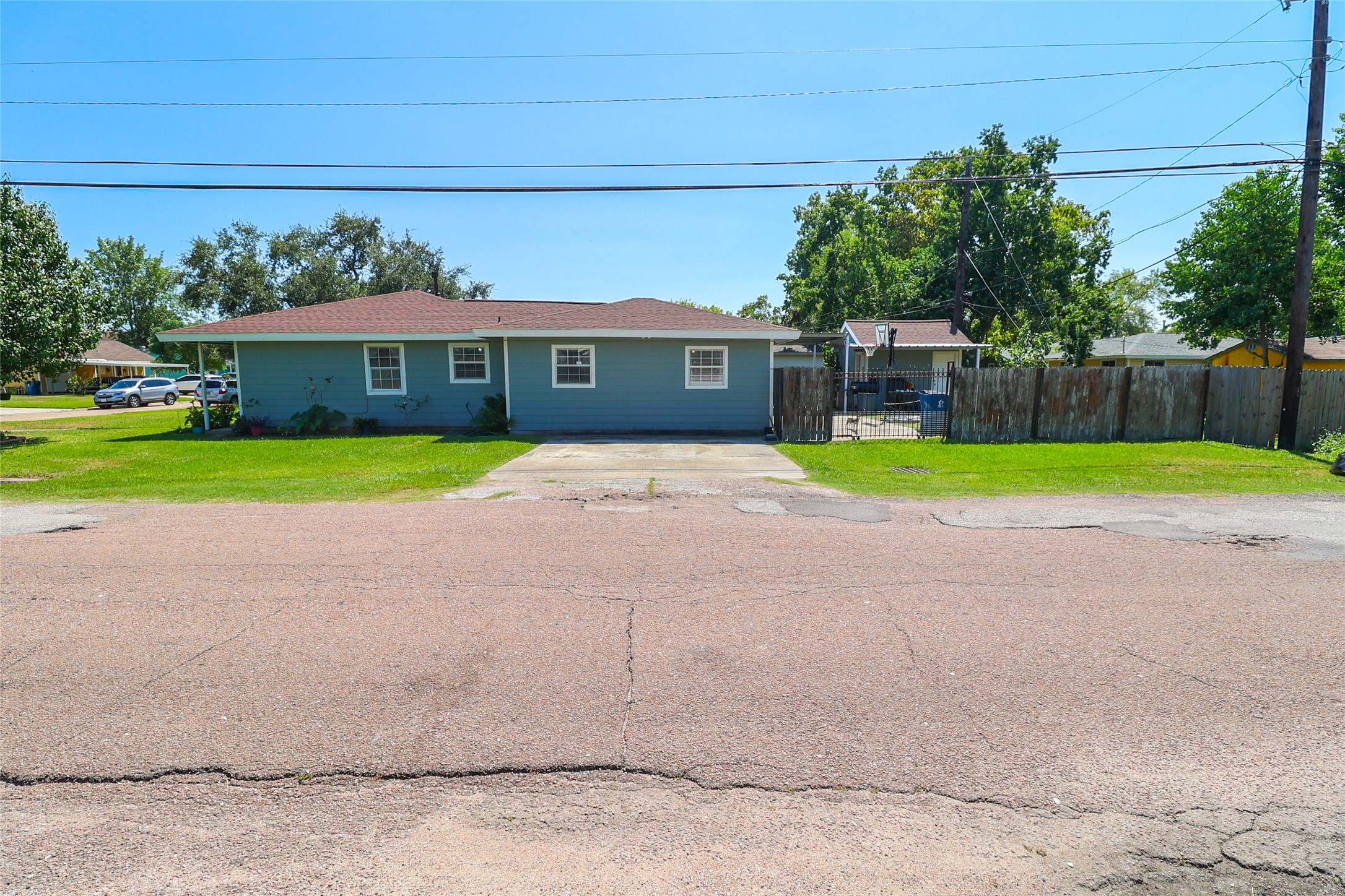 416 Clara Road South Houston, TX 77587 - Photo 47 of 50 a front view of a house with a yard and garage