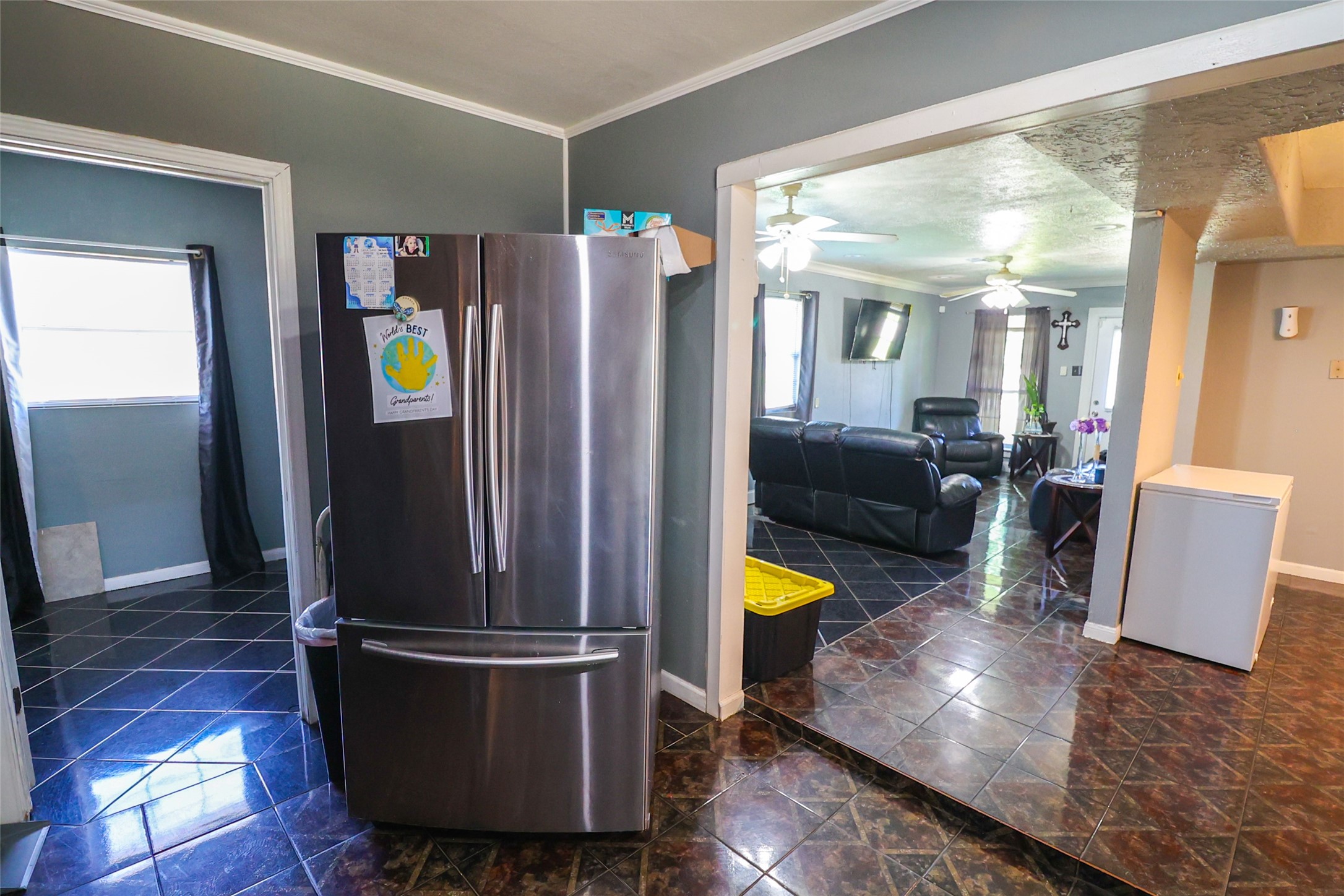416 Clara Road South Houston, TX 77587 - Photo 9 of 50 a kitchen with stainless steel appliances wooden floor and a living room