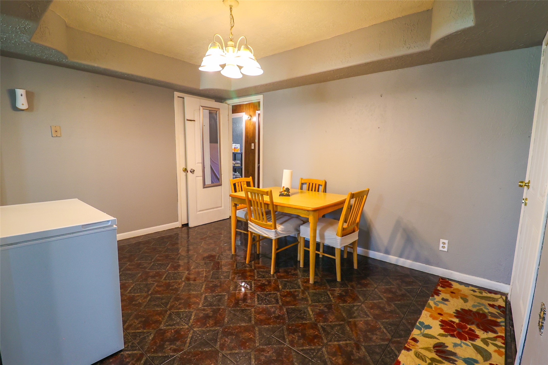 416 Clara Road South Houston, TX 77587 - Photo 10 of 50 a dining room with furniture and chandelier