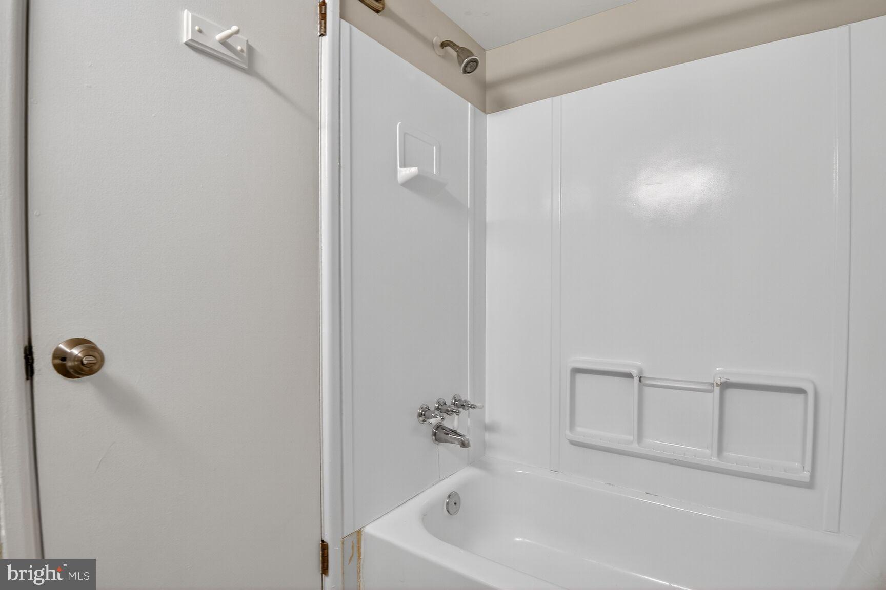 2907 Charing Cross Road, Unit 14 Falls Church, VA 22042 - Photo 15 of 15 a bathroom with a bathtub