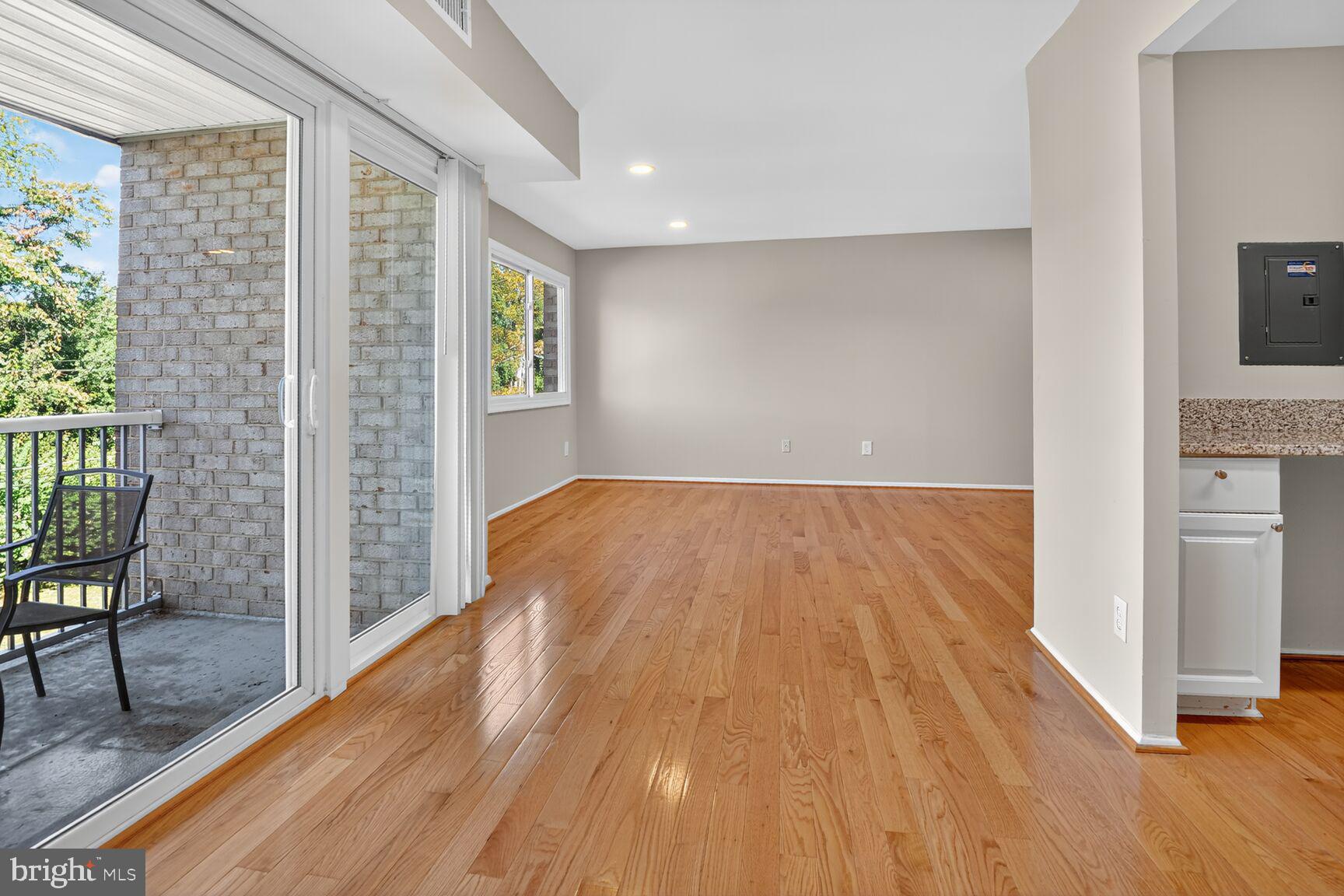 2907 Charing Cross Road, Unit 14 Falls Church, VA 22042 - Photo 7 of 15 a view of a room with wooden floor and furniture