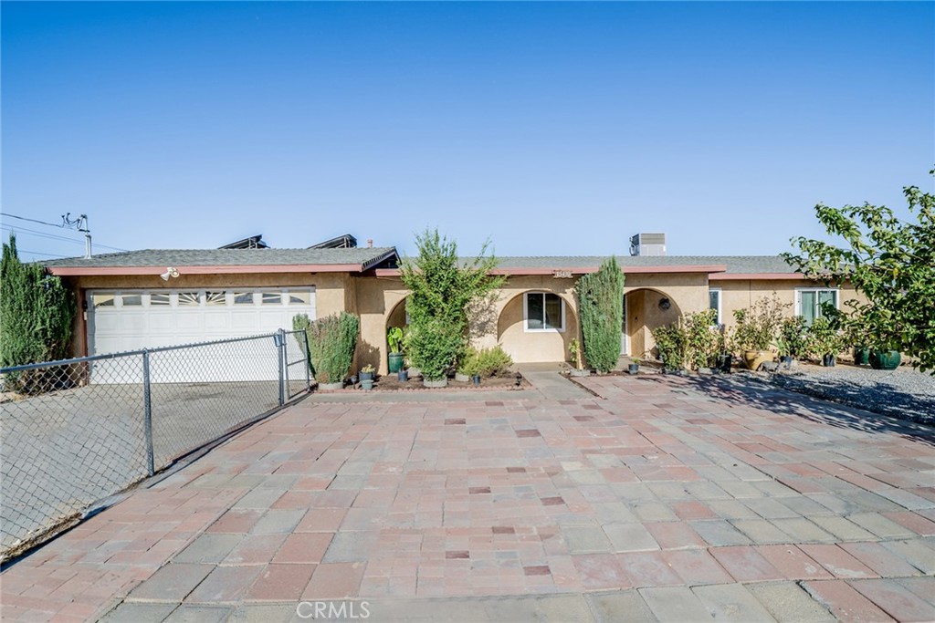 15430 Jaypost Road Victorville, CA 92394 - Photo 1 of 1 a view of a house with a street