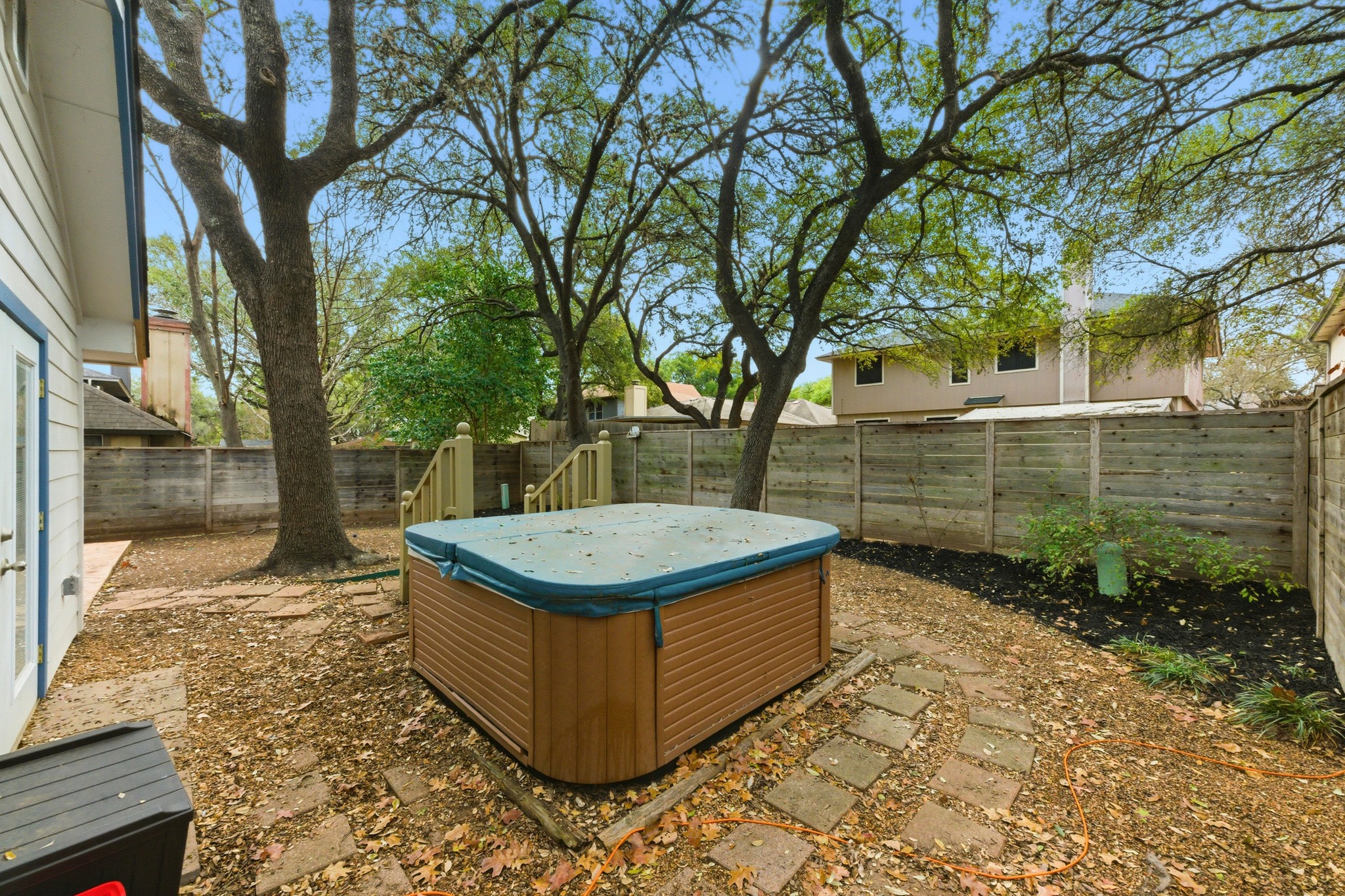 723 Shade Tree Drive Austin, TX 78748 - Photo 24 of 29 a view of a backyard with large trees
