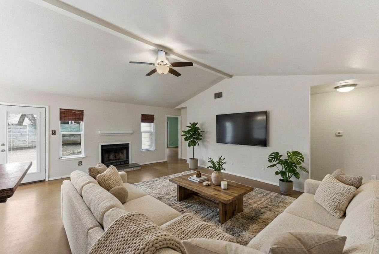 723 Shade Tree Drive Austin, TX 78748 - Photo 26 of 29 a living room with furniture fireplace and a flat screen tv
