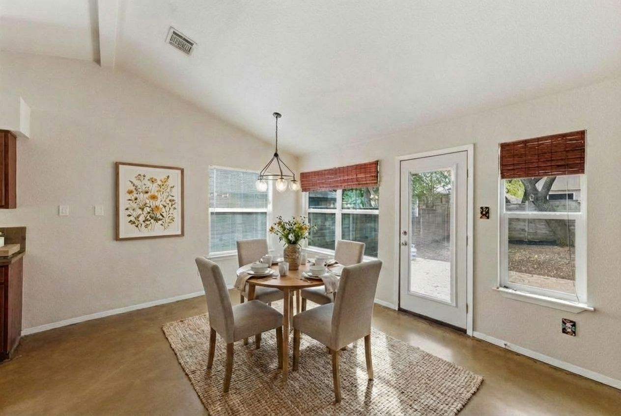 723 Shade Tree Drive Austin, TX 78748 - Photo 27 of 29 a dining room with furniture and window