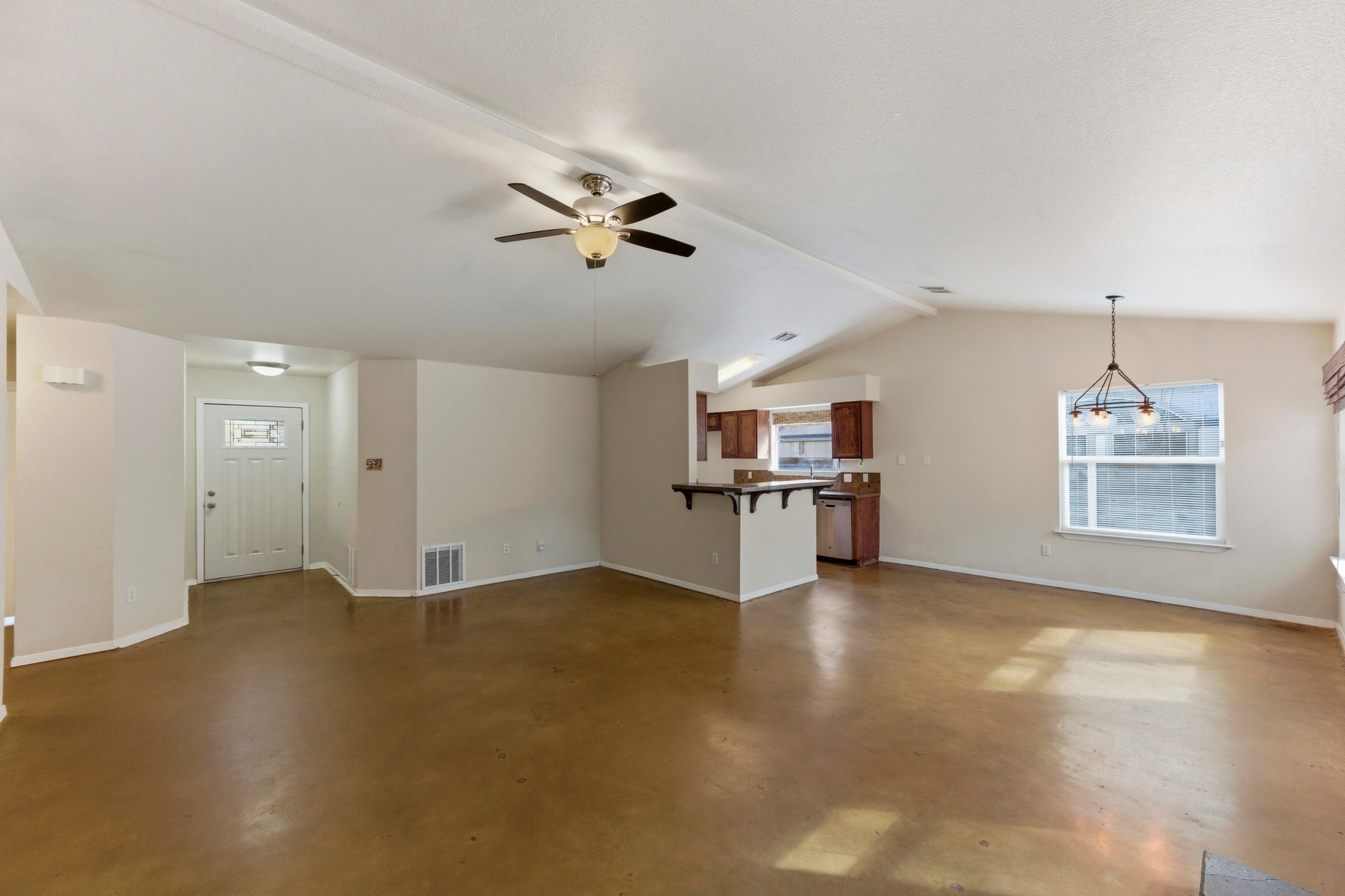 723 Shade Tree Drive Austin, TX 78748 - Photo 5 of 29 wooden floor in an empty room with a window