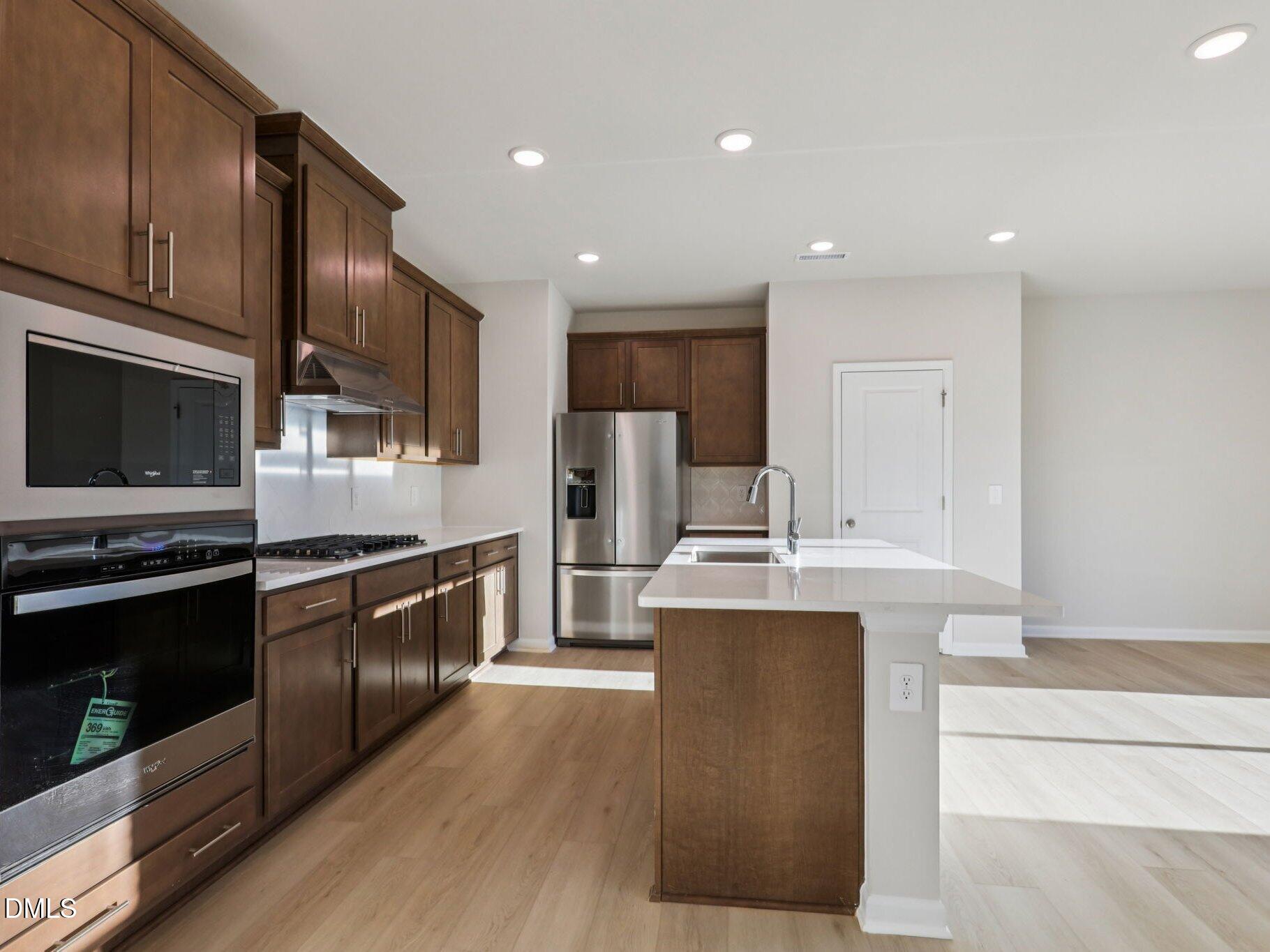 151 Field Sparrow Way Clayton, NC 27520 - Photo 11 of 31 5 - Kitchen