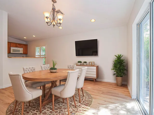 a view of a dining room with furniture