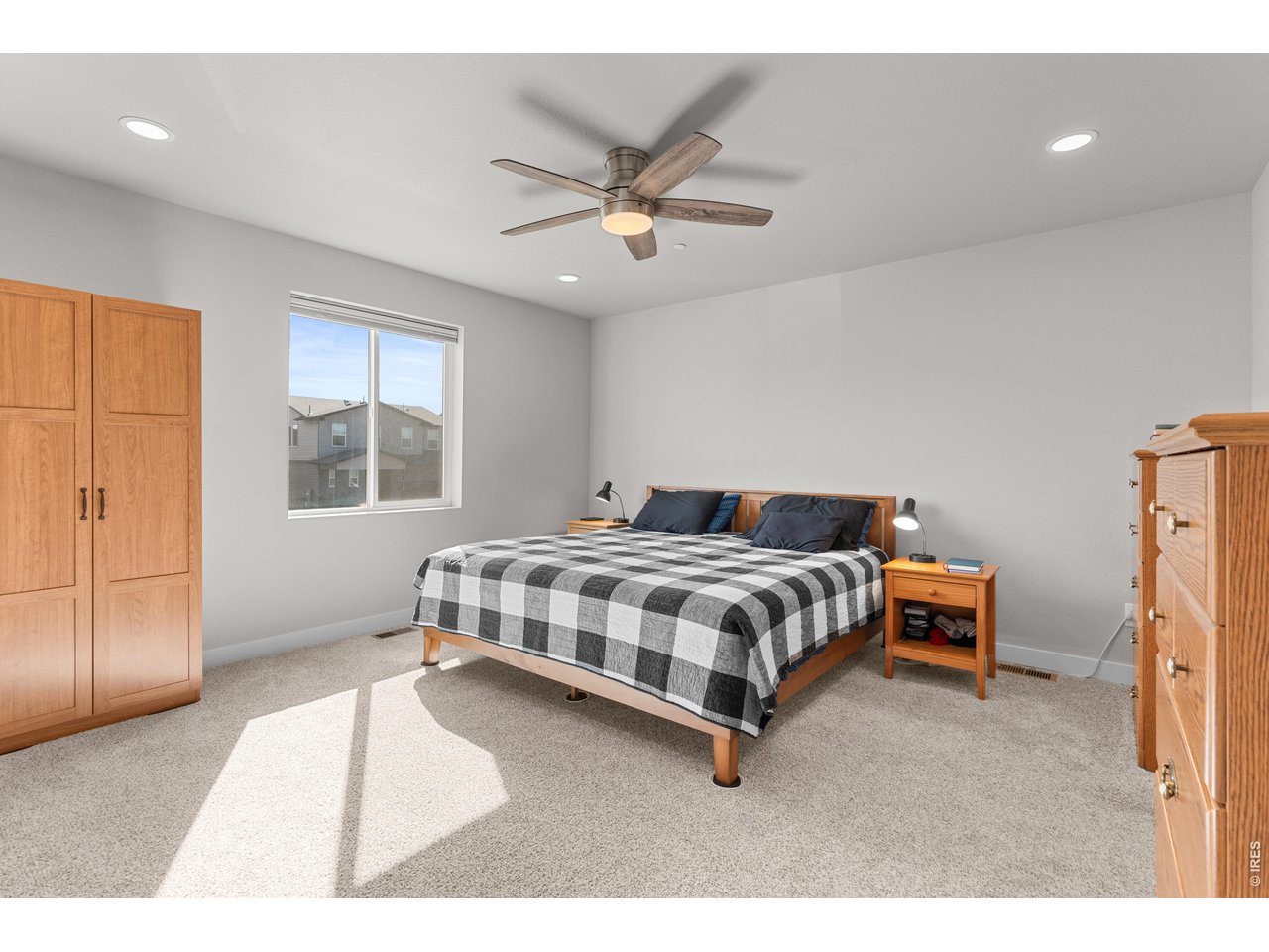 6611 4th Street, Unit 1 Greeley, CO 80634 - Photo 28 of 48 Private primary suite with 3/4 bathroom, double sinks, and walk-in closet.