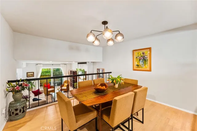 a living room with furniture rug and a large window