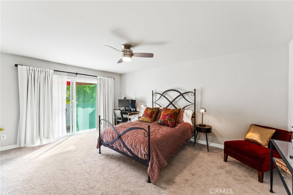 13243 Fiji Way, Unit K Marina del Rey, CA 90292 - Photo 22 of 39 a bedroom with a bed and a couch