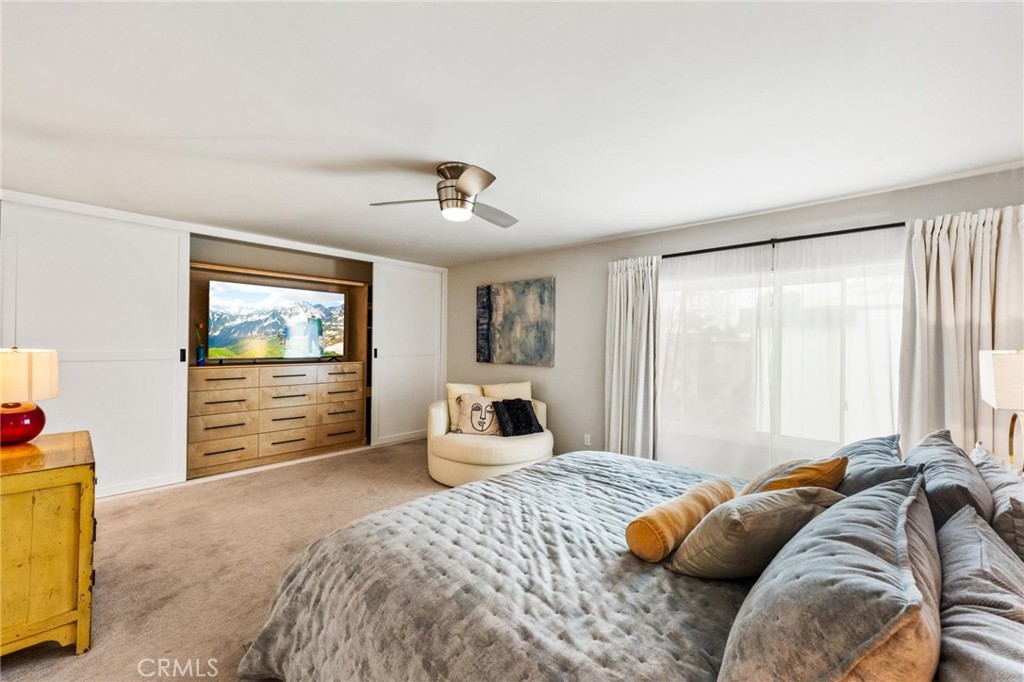 13243 Fiji Way, Unit K Marina del Rey, CA 90292 - Photo 25 of 39 a bedroom with a large bed and a window