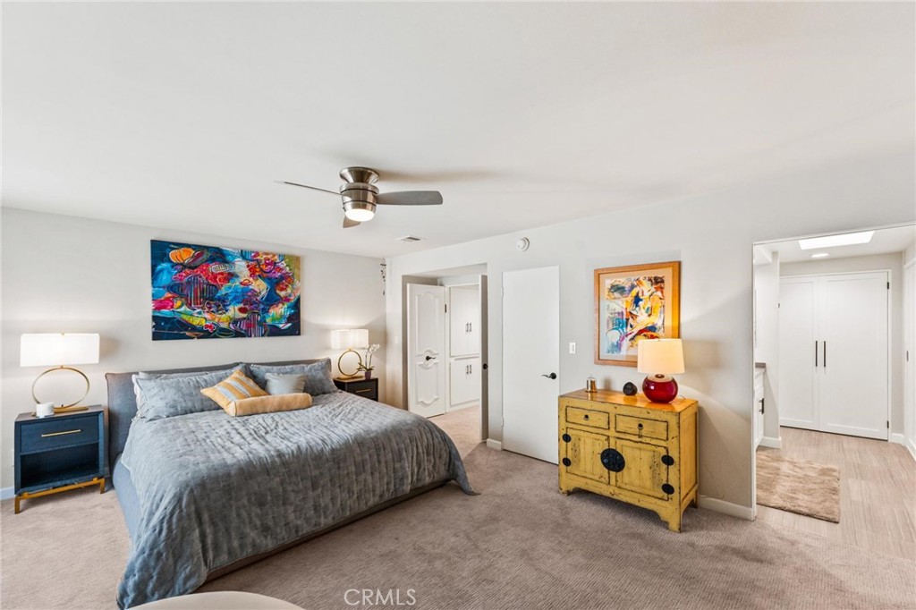 13243 Fiji Way, Unit K Marina del Rey, CA 90292 - Photo 27 of 39 a bedroom with a bed a couch and dresser